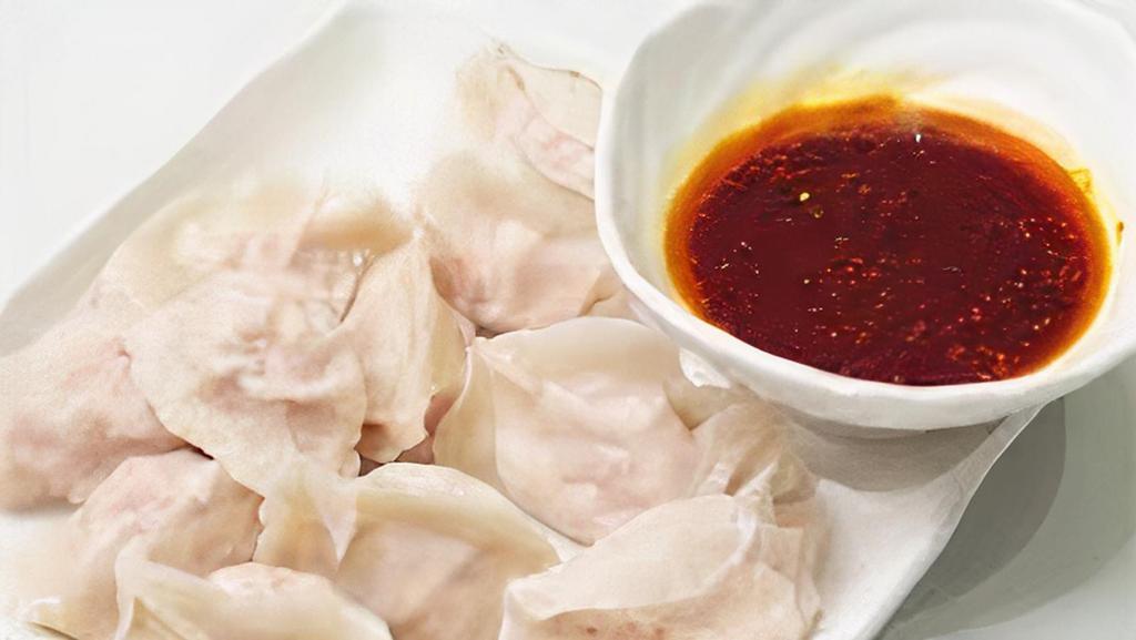 Pork Dumpling In Chili Oil · Eight pieces. Spicy.钟水饺