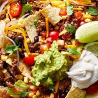Taco Salad · Your choice of meat, rice, refried pinto beans, lettuce, cheese, cilantro, onion, avocado, s...