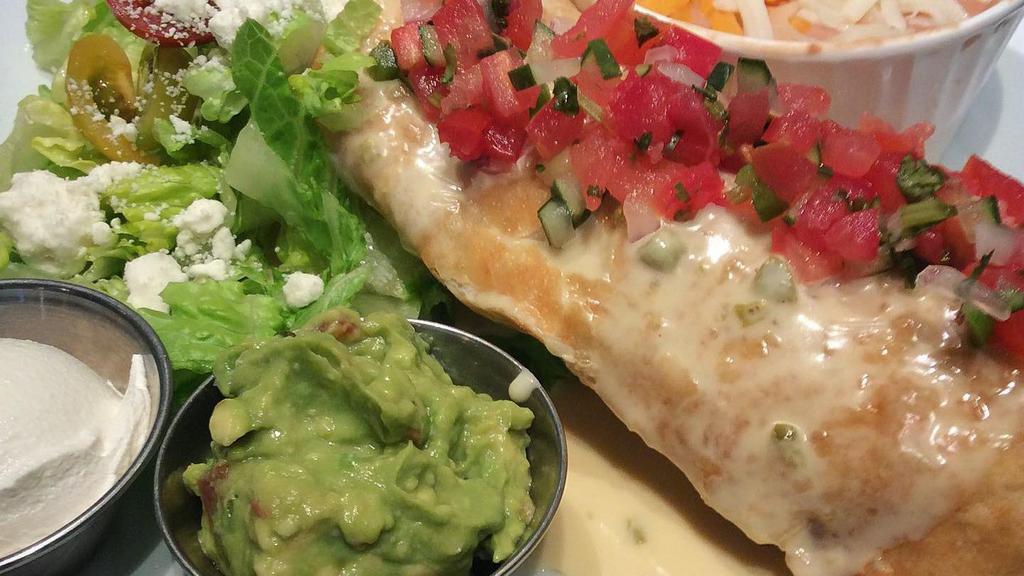 Chimichanga · Served with rice and beans