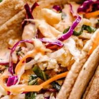 Fish Tacos · Served with rice and beans