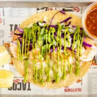 Shrimp Taco · Grilled shrimp on a crisp tortilla, melted cheese red cabbage, onion, cilantro, avocado sauc...