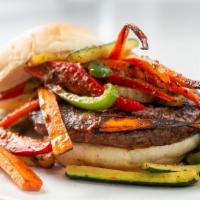 Caribbean · Sauteed zucchini, bell pepper, and carrot in spicy Caribbean jerk sauce. Spicy.