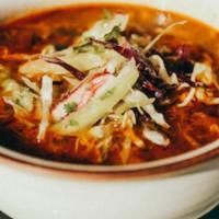 *Pozole Soup · Roasted pork in ancho chile broth with hominy, oregano, onions, cabbage, jalepeno and cilant...