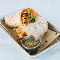 *Pollo Asado Burrito · Wood-fired chicken thigh with lettuce, salsa fresca, rice, guacamole, and our Mexican cheese...