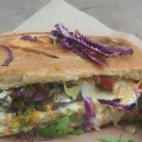 (P5)  Me & My Eco-Bag   (Roast Beef Cheddar Panini)   · Grilled chicken w/ roasted red bell, red onions, tomatoes, cheddar cheese, roasted herb-garl...