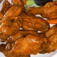 Wings · Mild, medium, hot, BBQ, and lemon pepper, served with choice of ranch or blue cheese.