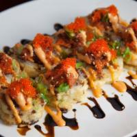 O.A.T. · Deep fried roll. Tempura shrimp, cream cheese and avocado deep fried and topped with spicy t...