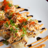 Sushi Bae · Spicy tuna, cucumber and tempura shrimp topped with shiro maguro (albacore) and avocado. Fin...