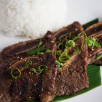 Beef Short Ribs · Grilled short ribs topped with wedashii's housemade teriyaki sauce.