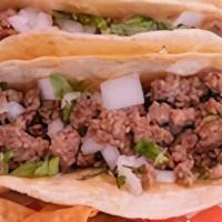 Ground Beef Tacos (3 Tacos) · Ground beef, cilantro, onions, and salsa on corn tortilla served with chips and salsa
