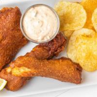 Joan'S Fish & Chips · Beer Batter dipped cod with tartar sauce and chips