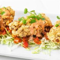 Cornmeal Fried Oysters · house shucked oysters battered in heirloom cornmeal served with spicy remoulade