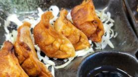Geso Karaage · Deep fried squid tentacles served with a side of sweet chili sauce.