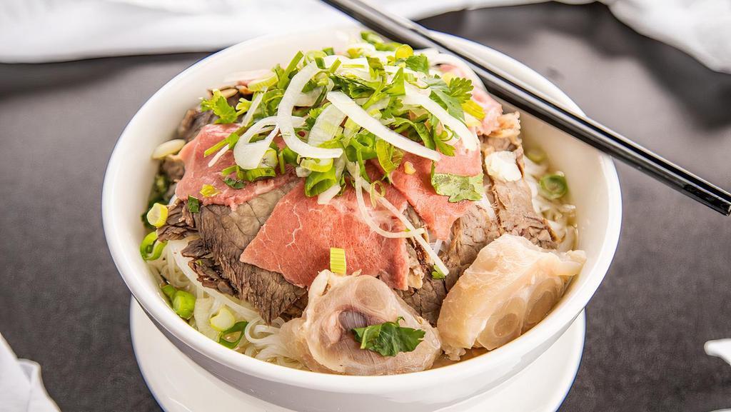 Combination Pho · Thinly sliced rare steak, brisket, meatballs, flank and tendon