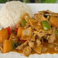 Orange Curry Over Rice · Orange curry with your choice of protein mixed with bell peppers, onions, squash and coconut...