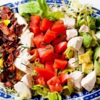 Cobb Salad · Lettuce, grilled chicken, bacon, hard boiled egg, onions, tomato, blue cheese dressing