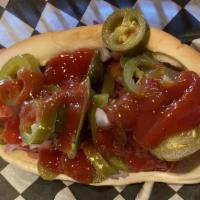 El Caifan Dog · Grilled 100% beef hot dog, bacon, jalapenos, tomatoes, onion, mayo, mustard and ketchup.