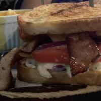 Highway To Hell Sandwich · Demon chicken sandwich. Fried chicken strips tossed in original hot sauce, jack cheese, baco...