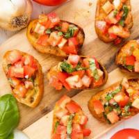 Bruschetta Garlic Bread · Tomatoes, garlic basil. Grilled bread topped with garlic and olive oil.
