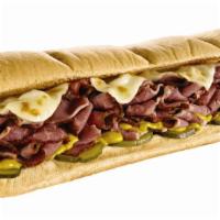 Pastrami Italian Sub · It comes with mustered pickles and melted cheese.