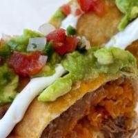 Chimichanga · Deep fried burrito, choice of meat, cheese, beans and rice. topped with guac, sour cream and...