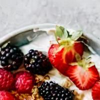 Granola And Yogurt · Greek yogurt, honey, seasonal berries, and granola.