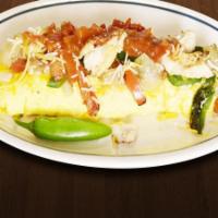 Southwestern Omelette · Chicken, onions, green peppers, jack and cheddar cheeses, topped with sour cream, salsa and ...