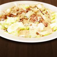 Cobb Salad · Mixed greens with fried or grilled chicken, hard-boiled egg, bacon, tomatoes with ranch dres...