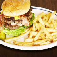 King'S Big Cheeseburger · Beef burger with two patties, two strips of bacon with American and white cheddar cheeses, t...