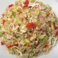 Chopped Turkey Salad · Fresh chopped iceberg lettuce, chopped turkey breast, beef salami, garbanzo beans, roasted p...