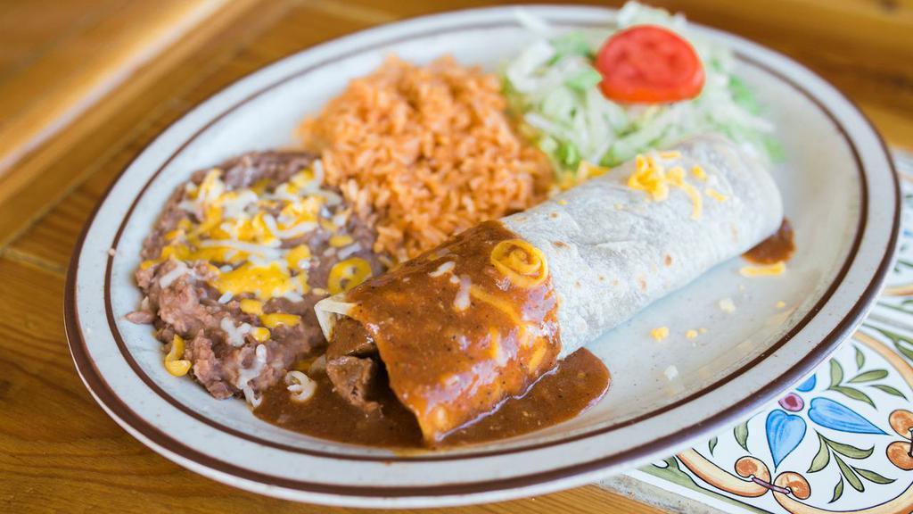 Burrito · Choice of: beef, pork, chicken, nopales or beans.