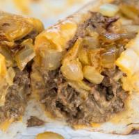 Ladie B'S Philly Cheesesteaks · Grilled steak, cheese, mushrooms, onions, jalapeños, bell peppers, mayo, on a garlic bun.