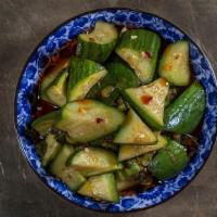 Marinated Cucumbers · Persian cucumbers marinated in sesame chile & fish sauce
