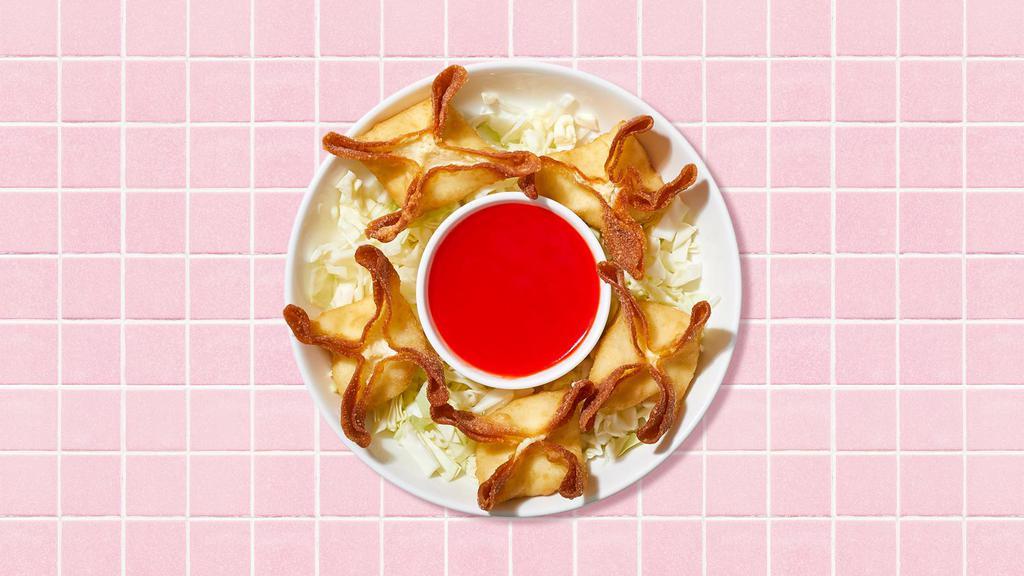 Fried Wontons · Eight fried wontons with dipping sauce.
