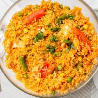 Vegetable Biryani · Subtly flavored basmati rice cooked with raisins, mixed vegetable, nuts and fruit.