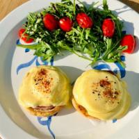 Classic Eggs Benedict · Canadian bacon , English muffin , Poached eggs , Hollandaise sauce