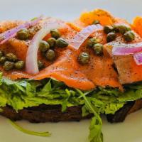 Smoked Salmon Toast · Organic avocado. Lime. Smoked salmon. Red onion
capers. Baby arugula. Dill. Black pepper. Ol...