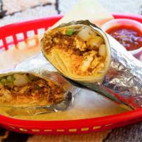 Breakfast Burrito · Your choice of breakfast meat scrambled with two eggs, diced red potatoes and cheese rolled ...