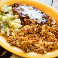 Huevos Chorizo Plate · Two eggs scrambled with chorizo (Mexican sausage) and cheese. Served with potatoes, beans, a...