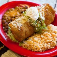Chimichanga · A flour tortilla filled with your choice of meat, cheese and salsa cruda, then deep fried un...