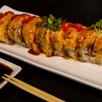 Golden Dragon · Torched. Torched, salmon, real crab meat, lemon, deep fried shrimp sweet, creamy sauce.