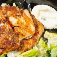 Grilled Chicken Salad · Grilled skinless chicken breast served over romaine lettuce, plum tomatoes and tossed with a...