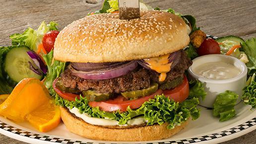 Bob'S Big Bear Burger · A 10 oz. all beef patty is specially seasoned and served with grilled onions, tomato, dill pickle chips, lettuce, mayonnaise & Thousand Island dressing. Served with your choice of side.. Make it DELUXE! – Add 2 slices of our thick-cut smoked bacon & your choice of cheese. ($)
