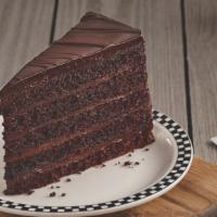5 Layer Chocolate Cake · Five layers of moist chocolate cake finished with an elegant dark chocolate ganache.