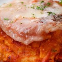 Lasagna Di Carne · Hand made pasta, layered with ground beef and pork and, herbed ricotta and marinara.