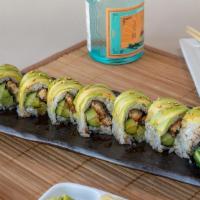 Dragon Roll · Eel and cucumber roll topped with avocado TOPPING : sesame seeds SAUCE : eel sauce