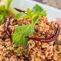 Larb Gai · Ground chicken, two hours slow roasted rice powder, red onion, mint, cilantro and in lime dr...