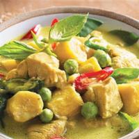 Green Curry · Green curry paste with young green chili, comes with bell pepper (red and green) bamboo, pea...