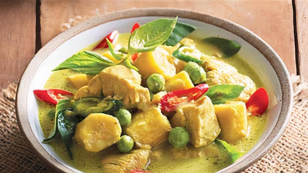 Green Curry · Green curry paste with young green chili, comes with bell pepper (red and green) bamboo, peas, basil leaf, kaffir lime leaf, finger root.