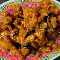 Chicken With Orange Flavor · Crunchy chunks of chicken deep fried until golden and marinated with delightful orange peel ...